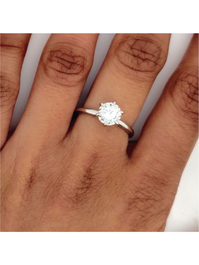 Pure Solitaire Diamond Ring. 18K White Gold, T=0.71ct.