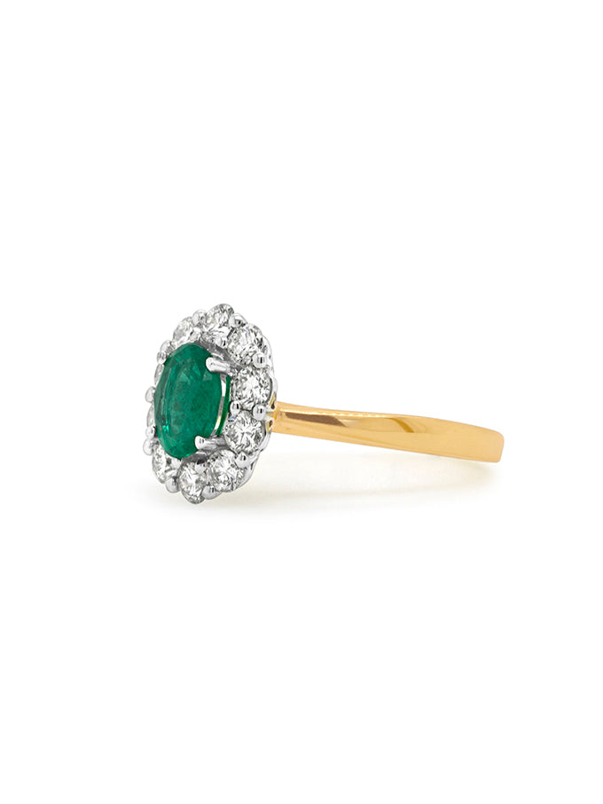 7x5mm Emerald & 0.70 Carat Diamond Cluster ring, 18 Carat Yellow Gold