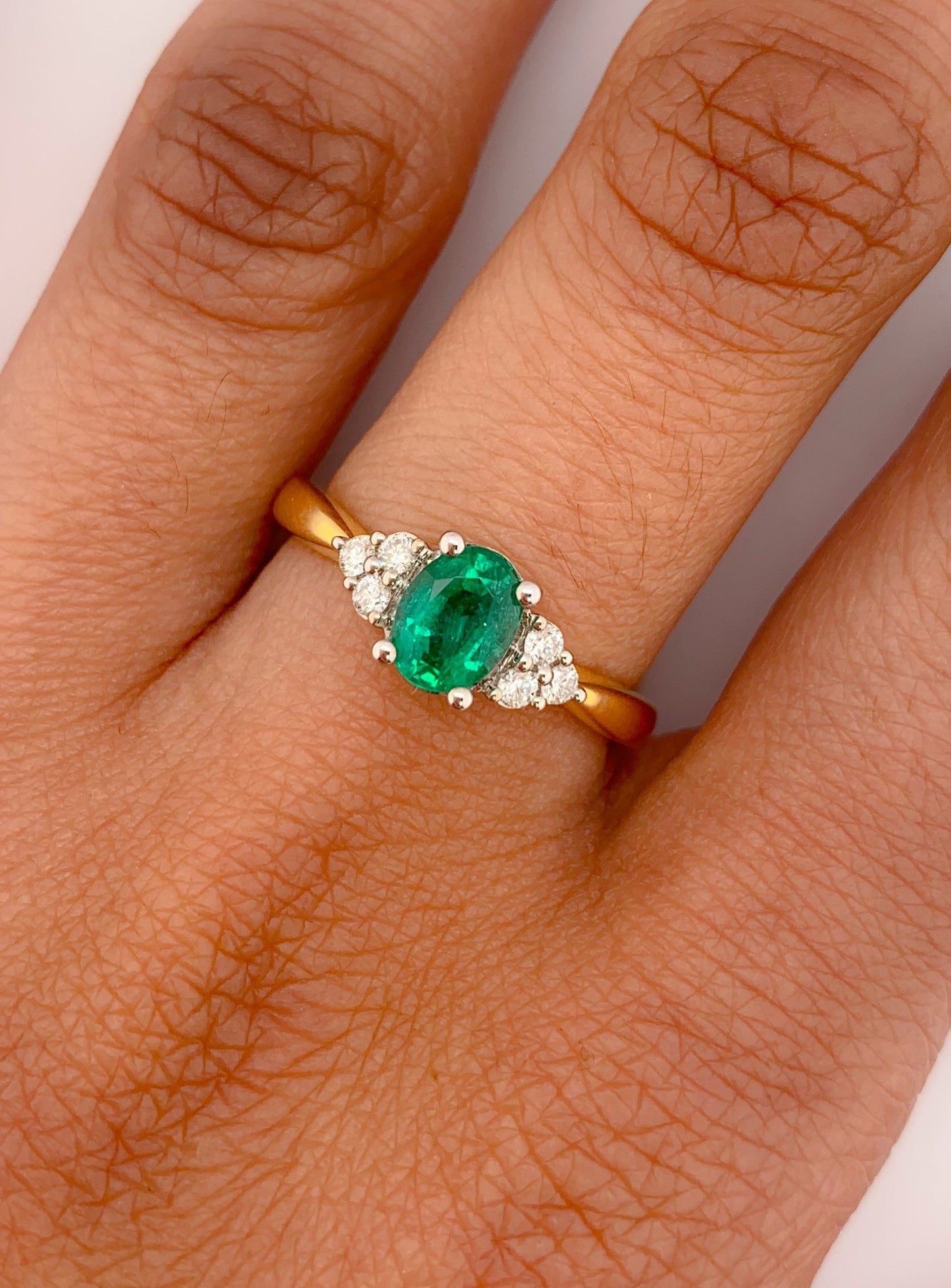 Natural Emerald & Diamonds Set Ring in 18 Carat Yellow Gold.