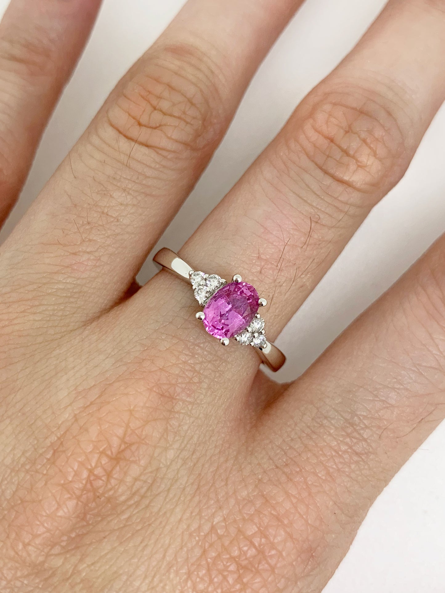 Pink Sapphire & Diamonds set in 18K White gold.