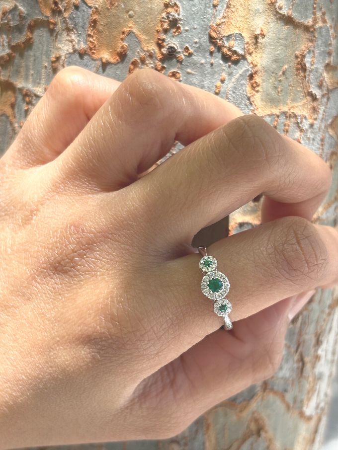 Emerald & Diamond Halo Trilogy Ring, 18 Carat White Gold.