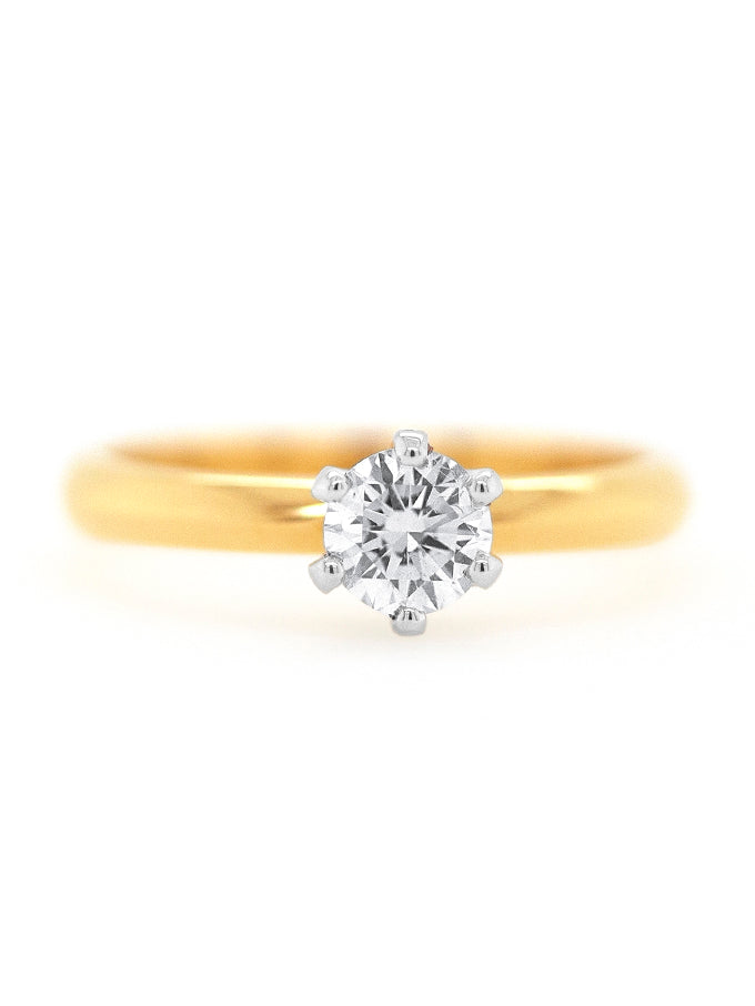 Solitaire 0.50 Carat Diamond ring, 18 Carat Yellow Gold.