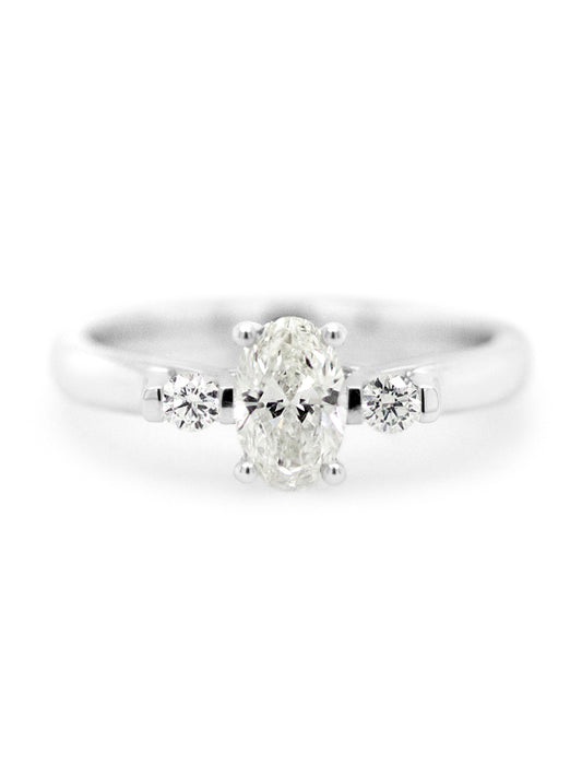 Trilogy Oval Diamond Ring, T=0.83 Carat, 18 Carat White Gold.